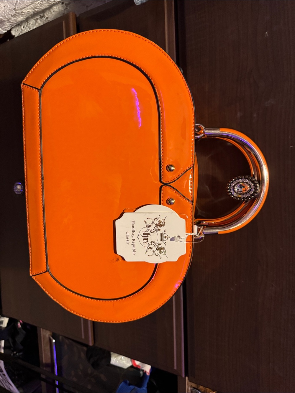 Patent Orange Mini Oval Top-Handle Bag with Decorative Metal Ring